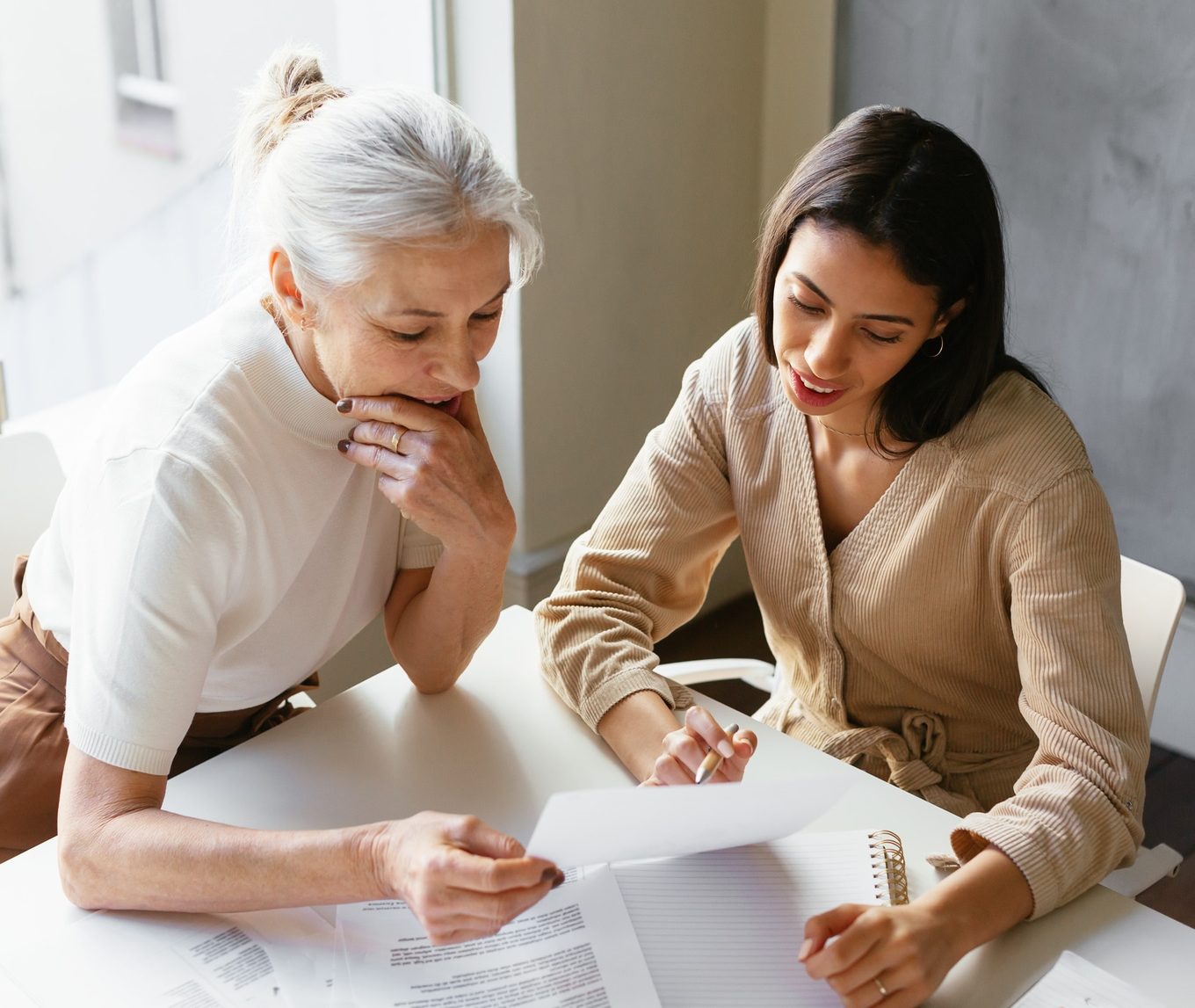 coworkers discussing order forms
