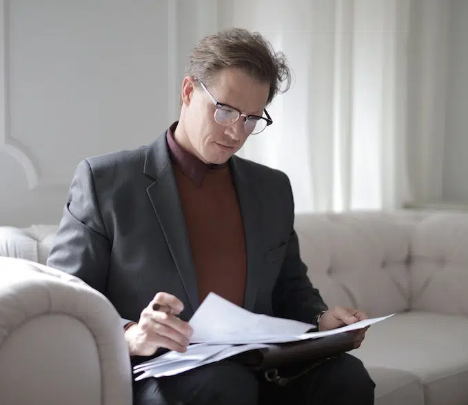 man assessing potential for risk in a contract