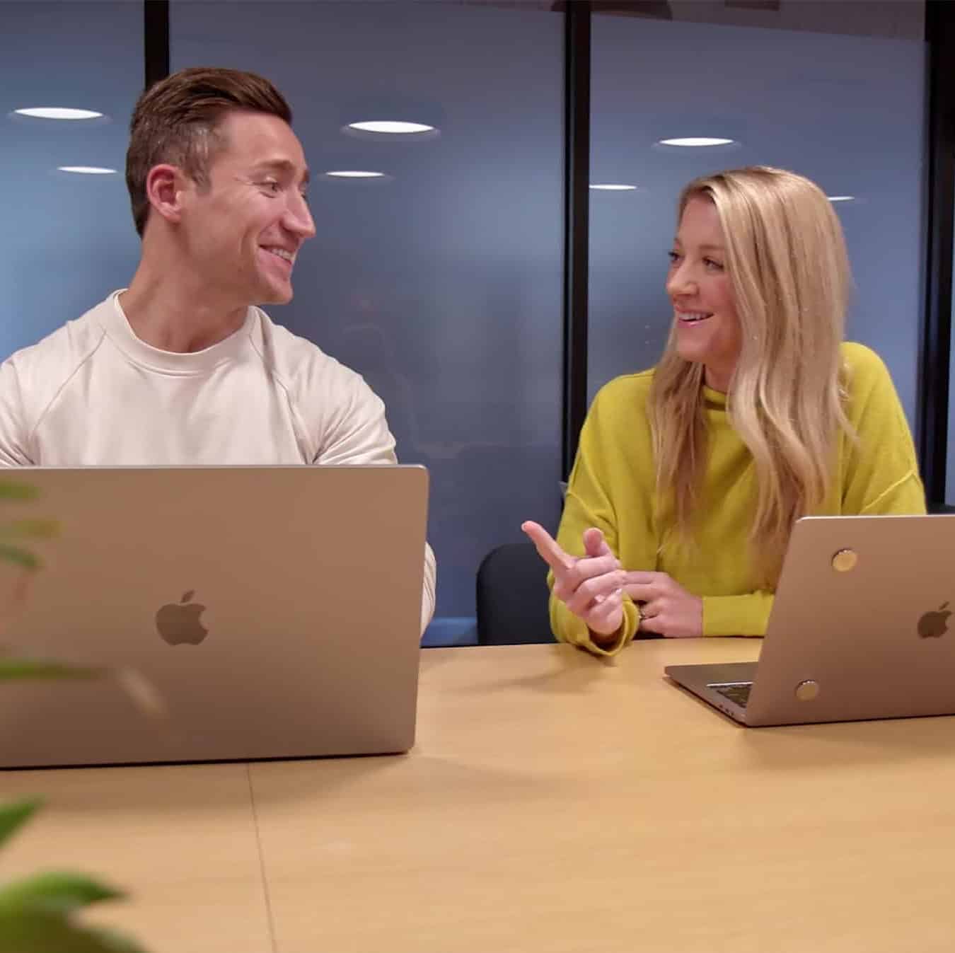 two coworkers talking