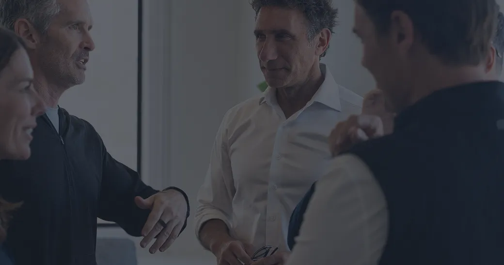 4 people talking in a circle