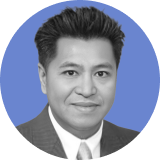 Professional headshot of a man with dark, styled hair, wearing a suit and tie, smiling slightly, set against a blue circular background, perfect for showcasing your Ironclad CLM expertise.