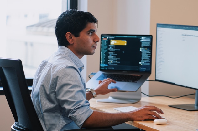 person sitting at a computer
